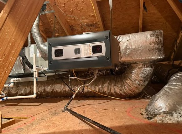 Air handler and insulated ductwork installed in a North Texas attic